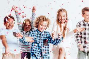 Kids with confetti